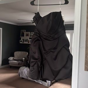Simple but elegant strapless black dress. Comes with straps if needed.